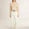 Women's beige sweater with 'Golden' lettering on the back
