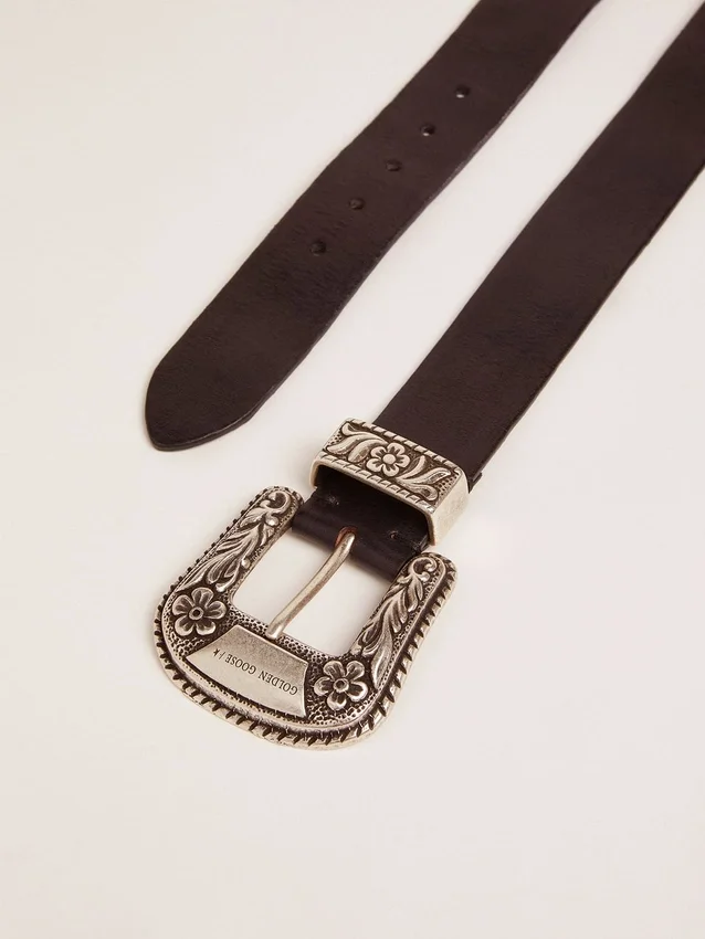 Women's belt in black leather with silver decorated buckle