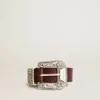 Women’s belt in burgundy leather with decorated silver buckle