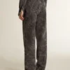 Women's black jeans with a floral motif