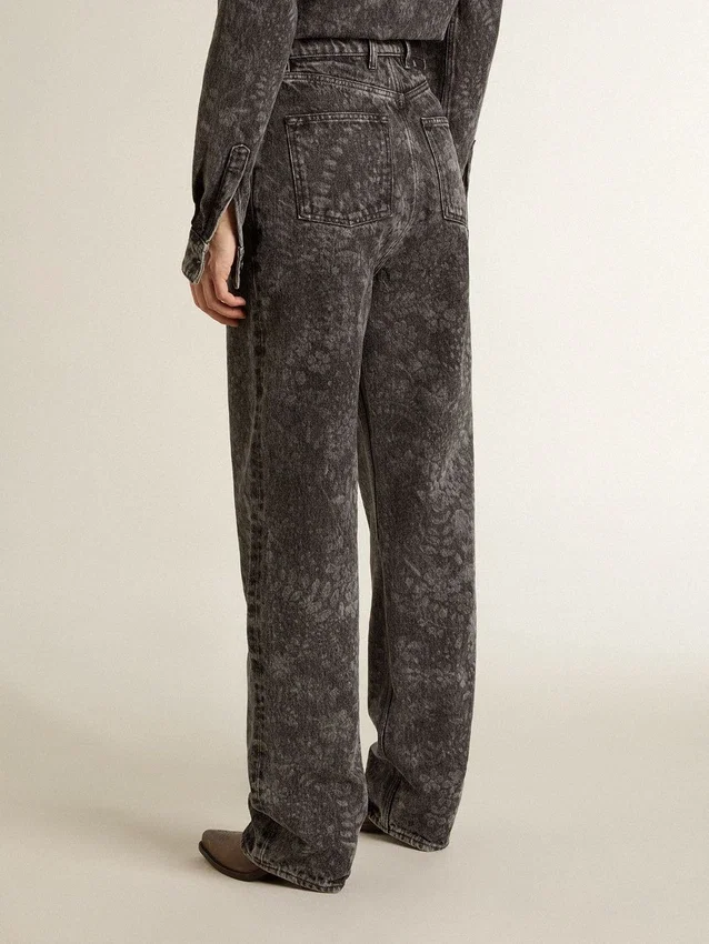 Women's black jeans with a floral motif