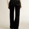 Women's black jeans with a velvet-like wash effect