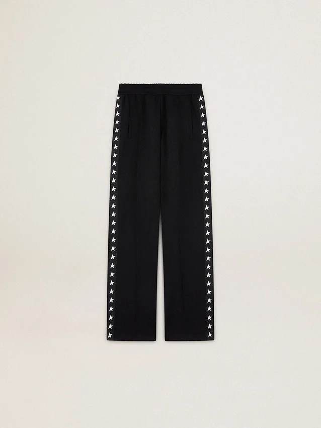 Women’s black joggers with white stars on the sides