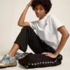 Women’s black joggers with white stars on the sides