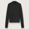 Women's black long-sleeve sports top with zip