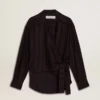 Women's black shirt with vertical stripes and side knot closure