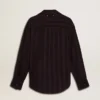 Women's black shirt with vertical stripes and side knot closure