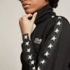 Women’s black zipped sweatshirt with white stars
