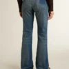 Women's bootcut jeans with a vintage wash and metallic details