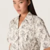 Women's boxy cotton shirt with black and white floral print