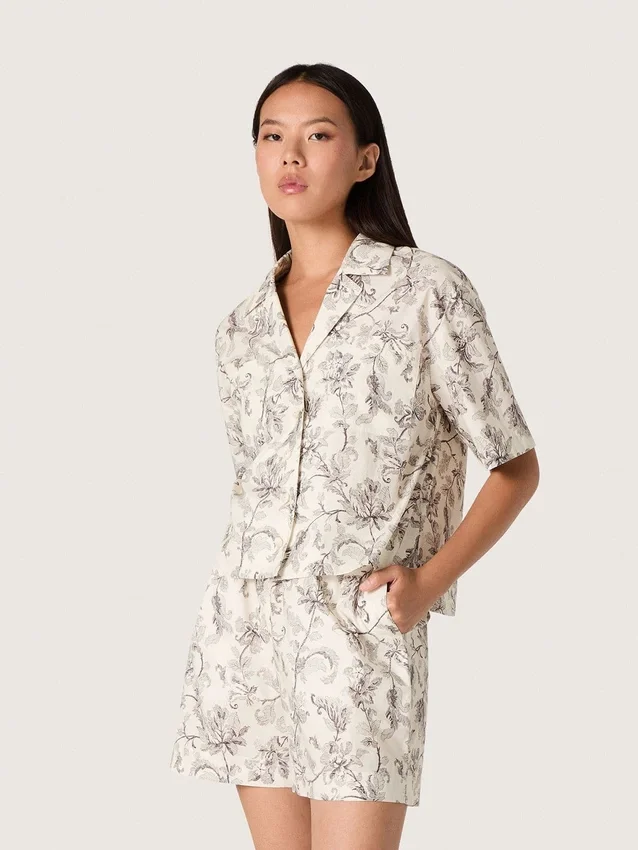 Women's boxy cotton shirt with black and white floral print