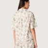 Women's boxy cotton shirt with black and white floral print