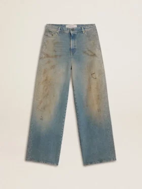 Women's boyfriend jeans with a lived-in effect sand wash and studs