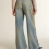Women's boyfriend jeans with a lived-in effect sand wash and studs