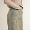 Women's boyfriend jeans with a lived-in effect sand wash and studs