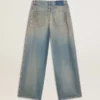 Women's boyfriend jeans with a lived-in effect sand wash and studs