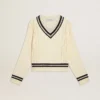 Women's cable-pattern cropped sweater with blue ribbing and crystals