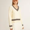 Women's cable-pattern cropped sweater with blue ribbing and crystals