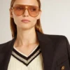 Women's cable-pattern cropped sweater with blue ribbing and crystals