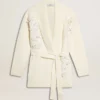 Women's cream-colored cotton cardigan with floral embroidery