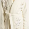 Women's cream-colored cotton cardigan with floral embroidery