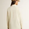 Women's cream-colored cotton shirt with floral embroidery