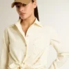 Women's cream-colored cotton shirt with floral embroidery