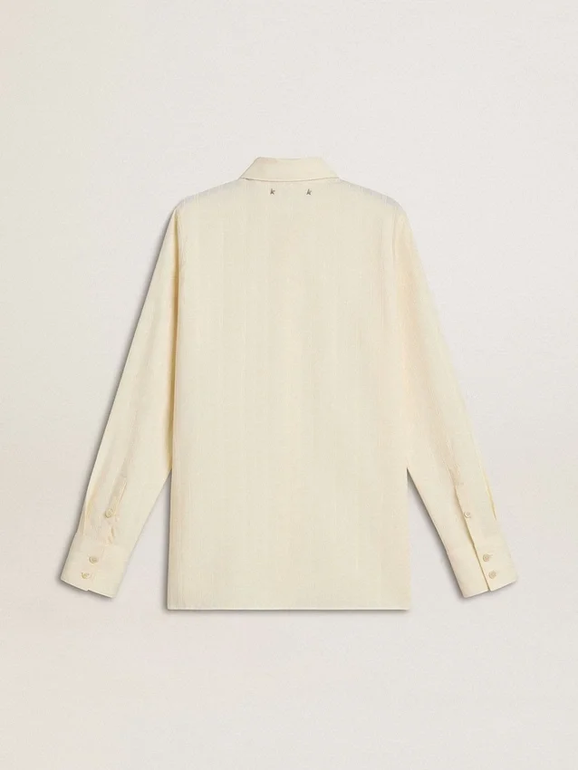 Women's cream-colored cotton shirt with floral embroidery