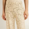 Women's cream-colored see-through lace pants