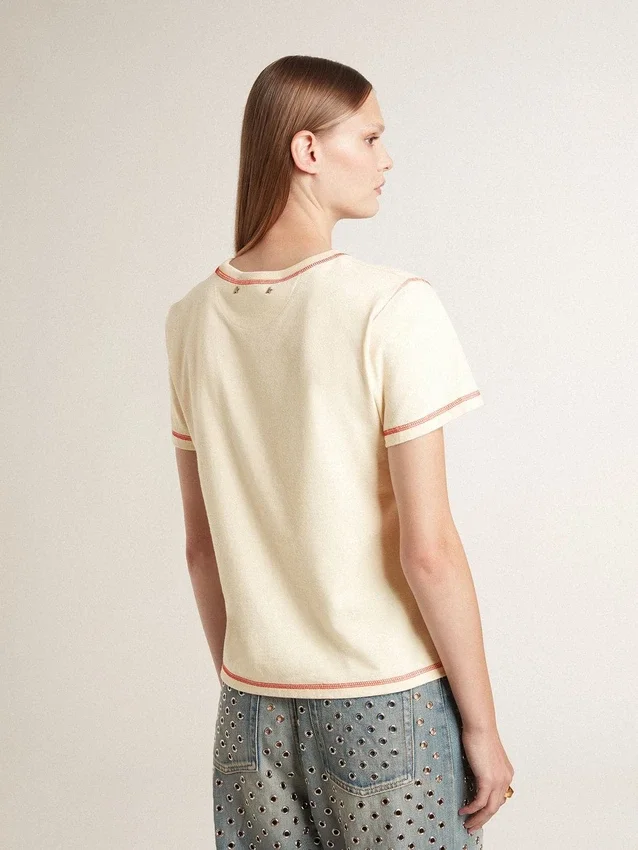 Women's cream T-shirt with faded red accents