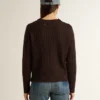 Women's crew-neck sweater in wool blend with gold buttons