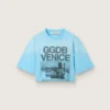 Women’s cropped T-shirt in light blue cotton jersey with graphic print