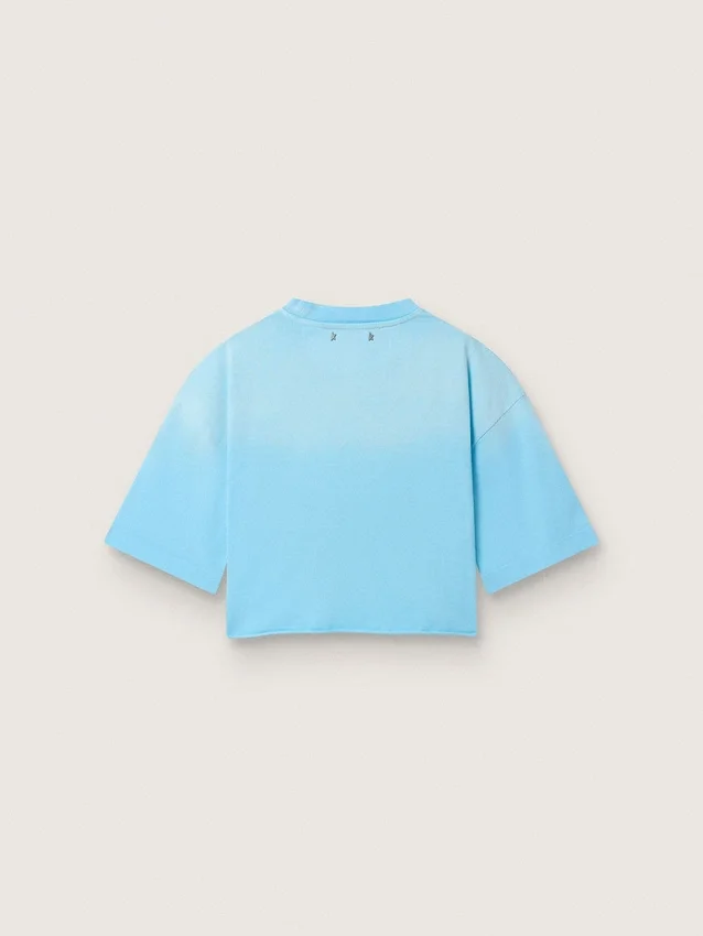 Women’s cropped T-shirt in light blue cotton jersey with graphic print