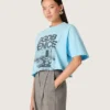 Women’s cropped T-shirt in light blue cotton jersey with graphic print