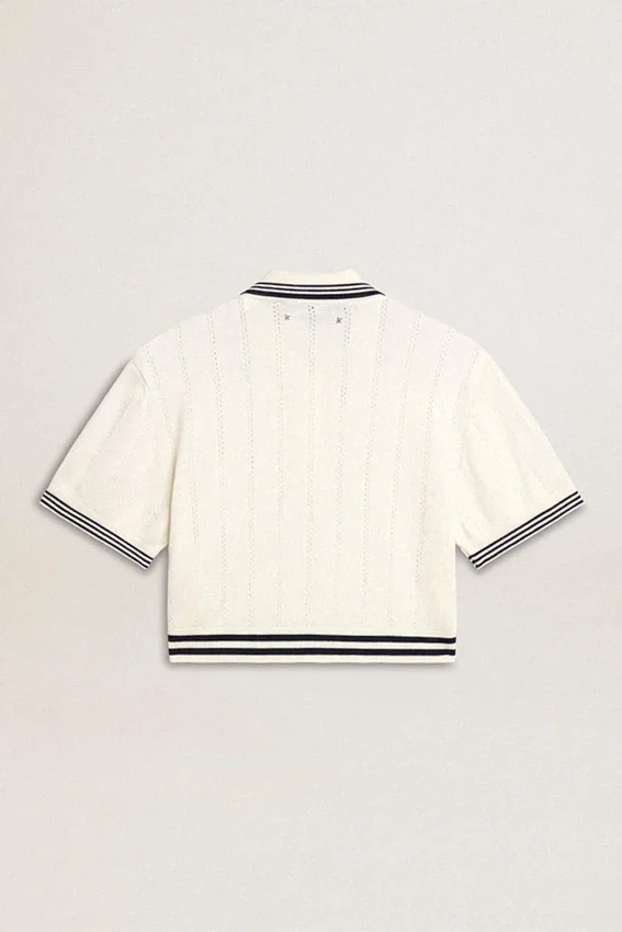 Women's cropped worn-white cotton polo shirt with blue ribbing