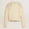 Women's cropped worn-white sweater with decorative crystals