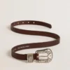Women's dark brown leather belt with decorated silver buckle