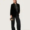 Women's pants in black cotton denim with a lived-in treatment