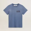 Women's faded light blue T-shirt with print on the chest