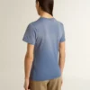 Women's faded light blue T-shirt with print on the chest