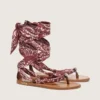 Women’s flat sandals with burgundy paisley pattern and jewel detail