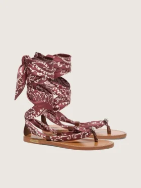 Women’s flat sandals with burgundy paisley pattern and jewel detail