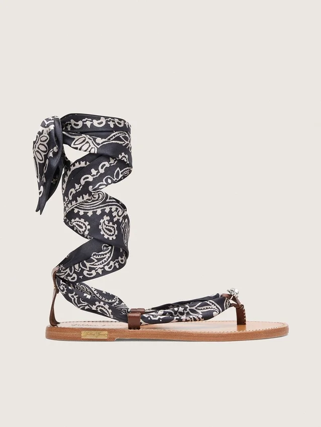 Women’s flat sandals with dark blue paisley pattern and jewel detail