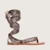Women’s flat sandals with gray paisley pattern and jewel detail