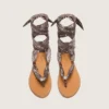 Women’s flat sandals with gray paisley pattern and jewel detail