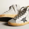 Women’s Francy in white suede with black leather star and silver Swarovski crystal tongue