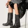 Women's high Biker boots in black leather with strap and silver-colored buckle