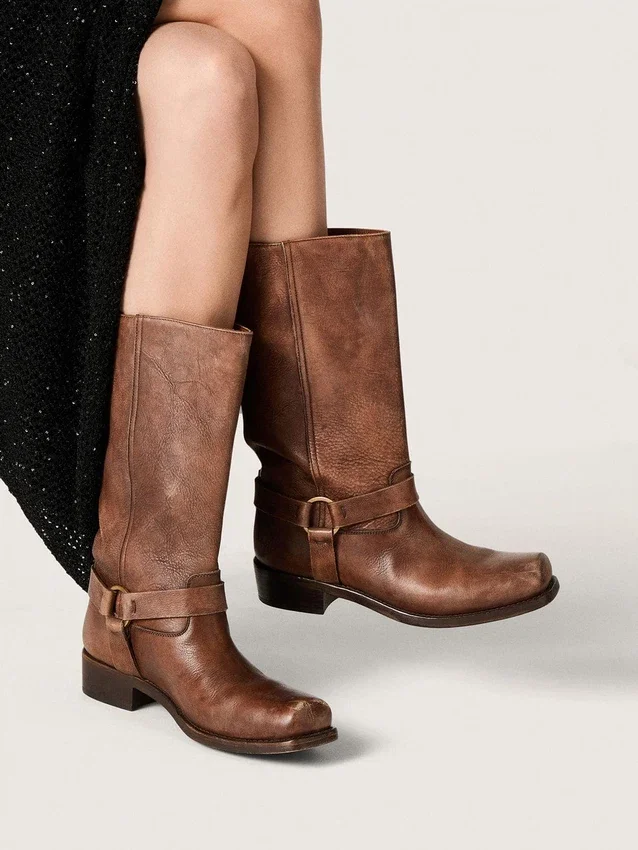 Women's high Biker boots in brown leather with strap and antique gold-colored buckle