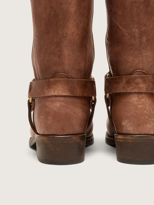 Women's high Biker boots in brown leather with strap and antique gold-colored buckle