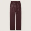 Women's jeans in burgundy denim with gradient crystals